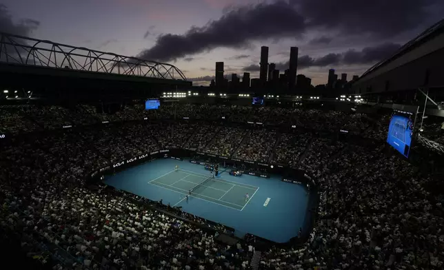 Aryna Sabalenka of Belarus and Anastasia Pavlyuchenkova of Russia play their quarterfinal match on Rod Laver Arena at the Australian Open tennis championship in Melbourne, Australia, Tuesday, Jan. 21, 2025. (AP Photo/Vincent Thian)