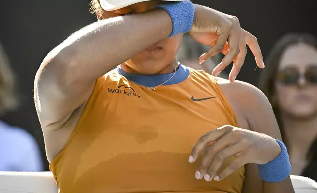 Naomi Osaka of Japan is emotional after forfeiting her match against Clara Tauson of Denmark in the finals singles match of the ASB Classic tennis tournament at Manuka Doctor Arena in Auckland, New Zealand, Sunday, Jan. 5, 2025. (Alan Lee/Photosport via AP)