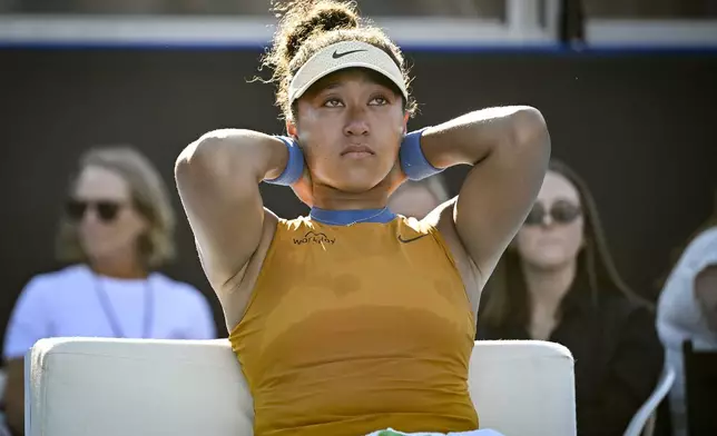 Naomi Osaka of Japan is emotional after forfeiting her match against Clara Tauson of Denmark in the finals singles match of the ASB Classic tennis tournament at Manuka Doctor Arena in Auckland, New Zealand, Sunday, Jan. 5, 2025. (Alan Lee/Photosport via AP)