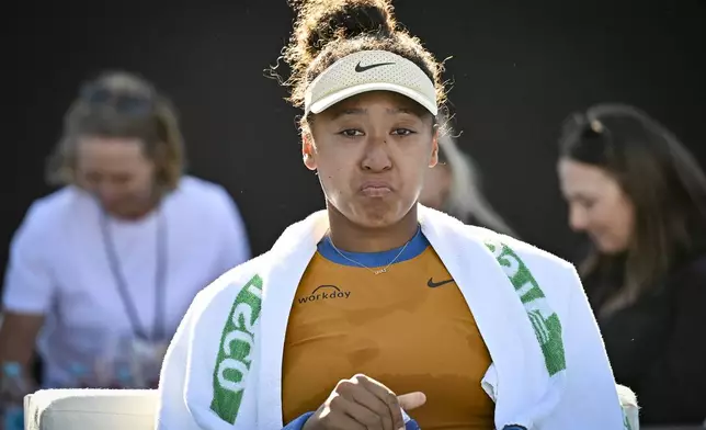 Naomi Osaka of Japan is emotional after forfeiting her match against Clara Tauson of Denmark in the finals singles match of the ASB Classic tennis tournament at Manuka Doctor Arena in Auckland, New Zealand, Sunday, Jan. 5, 2025. (Alan Lee/Photosport via AP)