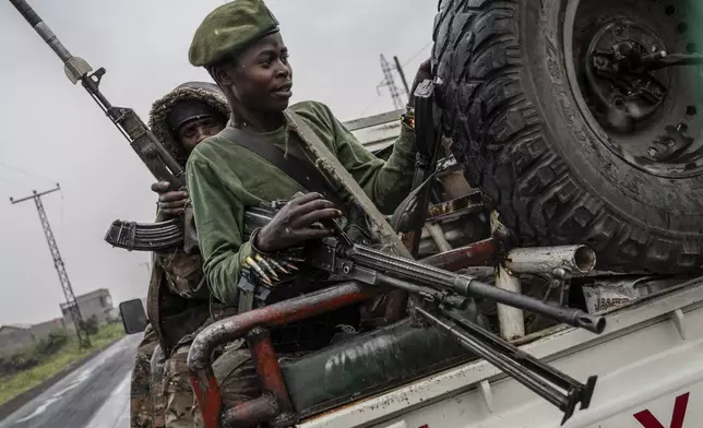 Congolese government troops deploy outside Goma, Democratic Republic of the Congo, Friday, Jan. 24, 2025, as M23 rebels are reported to close in on the town. (AP Photo/Moses Sawasawa)