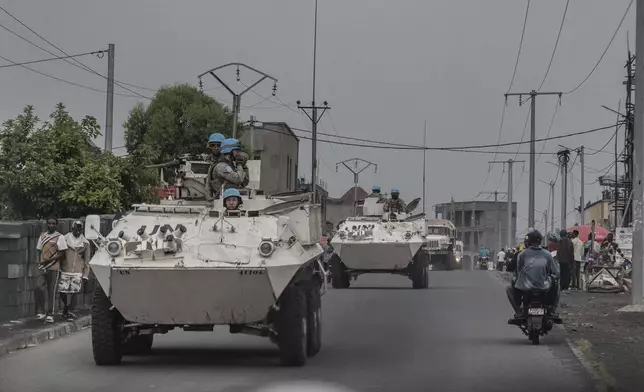 UN armoured personnel carriers deploy outside Goma, Democratic Republic of the Congo, Saturday, Jan. 25, 2025. (AP Photo/Moses Sawasawa)