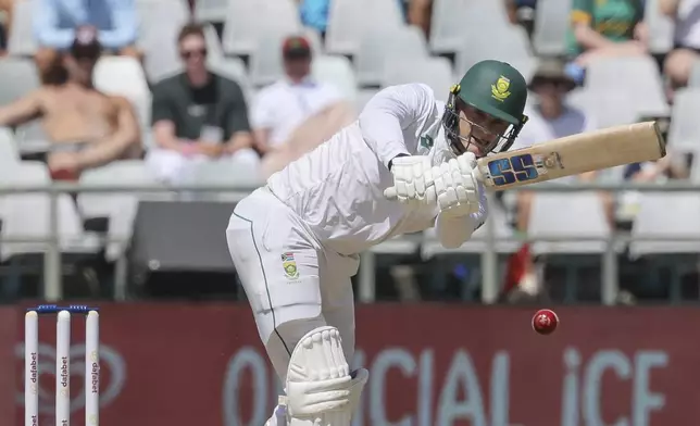 South Africa's Ryan Rickelton plays a shot during the second test match between South Africa and Pakistan in Cape Town, South Africa, Friday, Jan. 3, 2025. (AP Photo/Halden Krog)