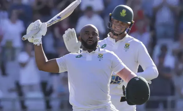 South Africa's Temba Bavuma celebrates his century during the second test match between South Africa and Pakistan in Cape Town, South Africa, Friday, Jan. 3, 2025. (AP Photo/Halden Krog)