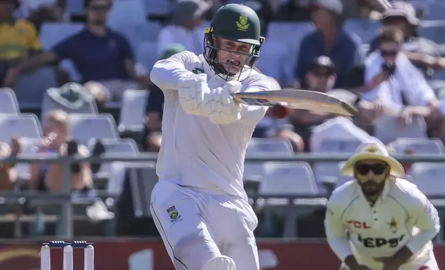 South Africa's Ryan Rickelton plays a shot during the second test match between South Africa and Pakistan in Cape Town, South Africa, Friday, Jan. 3, 2025. (AP Photo/Halden Krog)