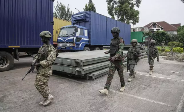 M23 rebels' patrol Gisenyi border point, Congo, Wednesday, Jan. 29, 2025, after they advanced into eastern Congo's capital Goma. (AP Photo/Brian Inganga)