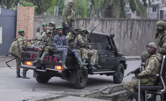 M23 rebels patrol the streets of Goma, Democratic Republic of the Congo, Wednesday, Jan. 29, 2025. (AP Photo/Brian Inganga)