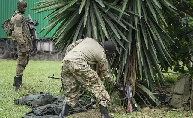 M23 rebels' patrol Gisenyi border point, Congo, Wednesday, Jan. 29, 2025, after they advanced into eastern Congo's capital Goma. (AP Photo/Brian Inganga)