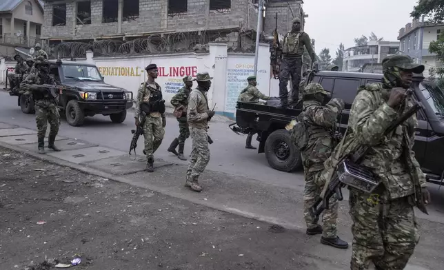 M23 rebels patrol in Goma, Democratic Republic of Congo, Wednesday, Jan. 29, 2025. (AP Photo/Brian Inganga)