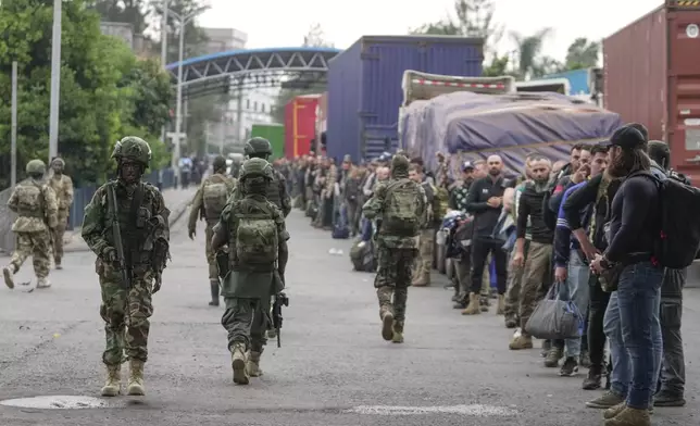 M23 rebels release captured Romanian mercenaries, who were fighting alongside Democratic Republic of Congo army (FRDC), at Gisenyi border point in Congo, Wednesday, Jan. 29, 2025, after the M23 rebels advanced into eastern Congo's capital Goma. (AP Photo/Brian Inganga)