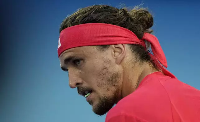 Alexander Zverev of Germany reacts during a break in his men's singles final against Jannik Sinner of Italy at the Australian Open tennis championship in Melbourne, Australia, Sunday, Jan. 26, 2025. (AP Photo/Ng Han Guan)