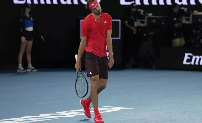 Alexander Zverev of Germany reacts during the men's singles final against Jannik Sinner of Italy at the Australian Open tennis championship in Melbourne, Australia, Sunday, Jan. 26, 2025. (AP Photo/Ng Han Guan)