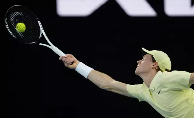 Jannik Sinner of Italy plays a forehand return to Alexander Zverev of Germany during the men's singles final at the Australian Open tennis championship in Melbourne, Australia, Sunday, Jan. 26, 2025. (AP Photo/Ng Han Guan)