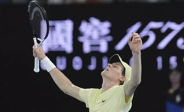 Jannik Sinner of Italy celebrates after defeating Alexander Zverev of Germany in the men's singles final at the Australian Open tennis championship in Melbourne, Australia, Sunday, Jan. 26, 2025. (AP Photo/Ng Han Guan)
