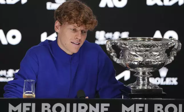 Jannik Sinner of Italy reacts during a press conference after defeating Alexander Zverev of Germany in the men's singles final at the Australian Open tennis championship in Melbourne, Australia, Monday, Jan. 27, 2025. (AP Photo/Manish Swarup)