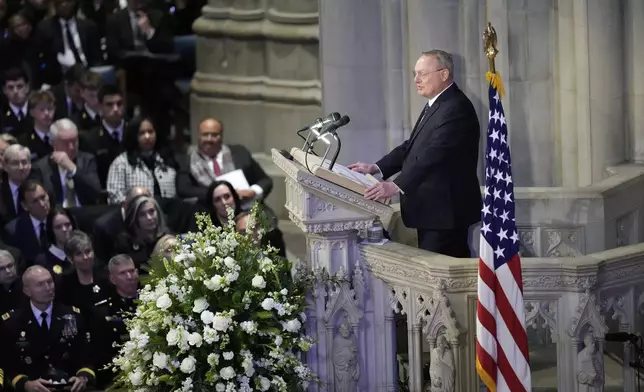 Ted Mondale, son of the late former Vice President Walter Mondale, speaks a tribute written by his father, during the state funeral for former President Jimmy Carter at Washington National Cathedral in Washington, Thursday, Jan. 9, 2025. (AP Photo/Ben Curtis)