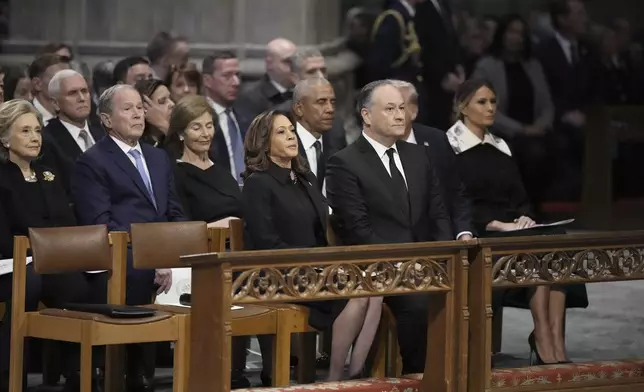 Vice President Kamala Harris, second gentleman Doug Emhoff, former First Lady Hillary Clinton, former President George W. Bush, former first lady Laura Bush, former President Barack Obama, former President and President-elect Donald Trump, former first lady Melania Trump, former Vice President Mike Pence and others, attend the state funeral for former President Jimmy Carter at Washington National Cathedral in Washington, Thursday, Jan. 9, 2025. (AP Photo/Ben Curtis)