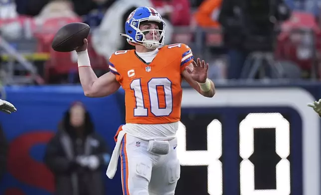 Denver Broncos quarterback Bo Nix (10) throws during the second half of an NFL football game against the Kansas City Chiefs Sunday, Jan. 5, 2025, in Denver. (AP Photo/David Zalubowski)