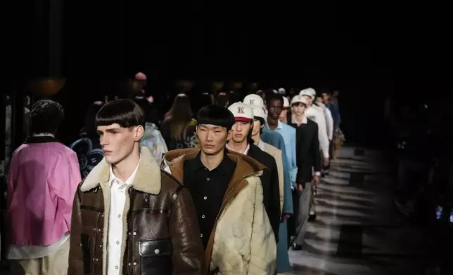 Models wear creations for the men's Kenzo Fall-Winter 2025-2026 collection, in Paris, Friday, Jan. 24, 2025. (AP Photo/Michel Euler)