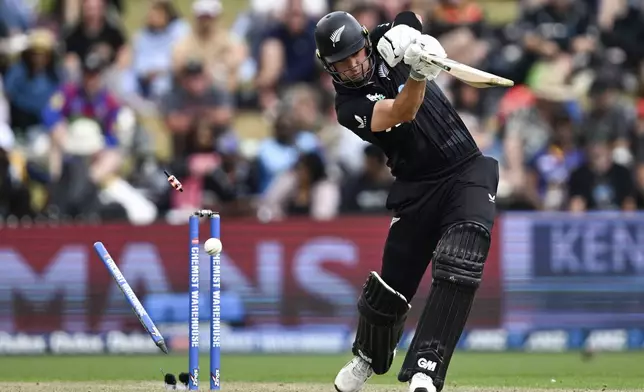 New Zealand's Will Young is bowled by Sri Lanka's Asitha Fernando during their one day international cricket match in Hamilton, New Zealand. Wednesday, Jan. 8, 2025. (Andrew Cornaga/Photosport via AP)