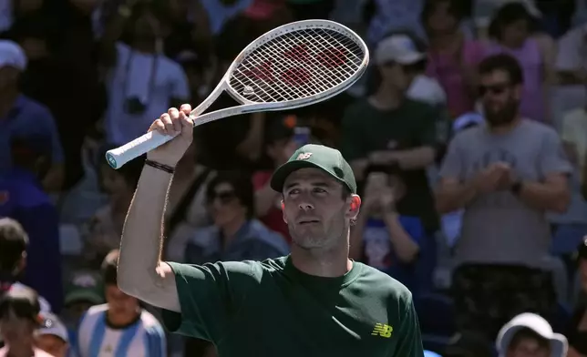 Tommy Paul of the U.S. celebrates after defeating Roberto Carballes Baena of Spain in their third round match at the Australian Open tennis championship in Melbourne, Australia, Friday, Jan. 17, 2025. (AP Photo/Manish Swarup)
