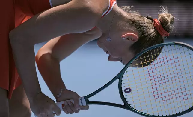 Marta Kostyuk of Ukraine reacts during her third round match against Paula Badosa of Spain at the Australian Open tennis championship in Melbourne, Australia, Friday, Jan. 17, 2025. (AP Photo/Ng Han Guan)