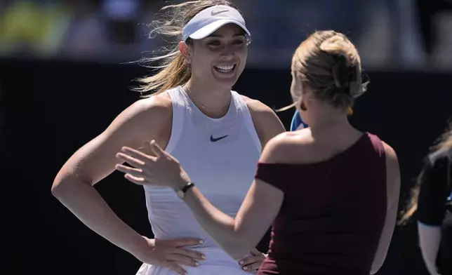 Paula Badosa of Spain reacts as she is interviewed on court following her third round win over Marta Kostyuk of Ukraine at the Australian Open tennis championship in Melbourne, Australia, Friday, Jan. 17, 2025. (AP Photo/Ng Han Guan)