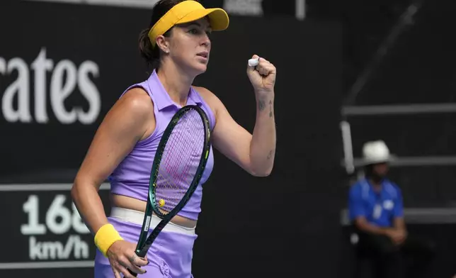 Anastasia Pavlyuchenkova of Russia reacts after winning the first set against Laura Siegemund of Germany during their third round match at the Australian Open tennis championship in Melbourne, Australia, Friday, Jan. 17, 2025. (AP Photo/Manish Swarup)