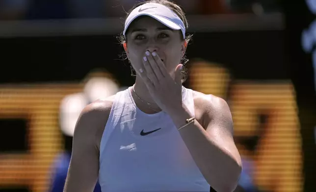 Paula Badosa of Spain celebrates after defeating Marta Kostyuk of Ukraine in their third round match at the Australian Open tennis championship in Melbourne, Australia, Friday, Jan. 17, 2025. (AP Photo/Ng Han Guan)