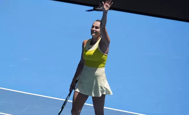 Aryna Sabalenka of Belarus celebrates after defeating Clara Tauson of Denmark in their third round match at the Australian Open tennis championship in Melbourne, Australia, Friday, Jan. 17, 2025. (AP Photo/Asanka Brendon Ratnayake)