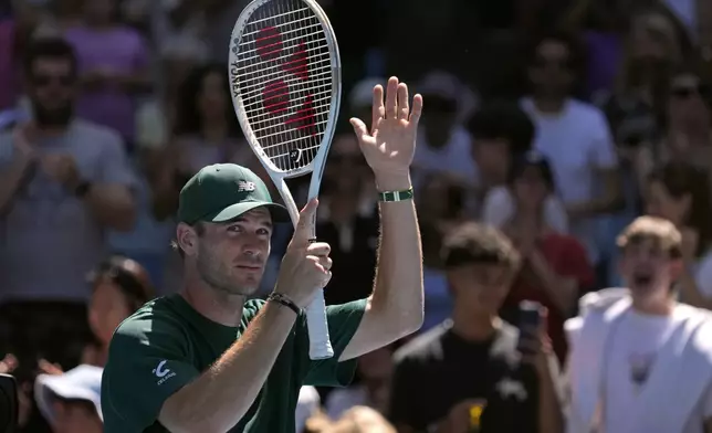 Tommy Paul of the U.S. celebrates after defeating Roberto Carballes Baena of Spain in their third round match at the Australian Open tennis championship in Melbourne, Australia, Friday, Jan. 17, 2025. (AP Photo/Manish Swarup)