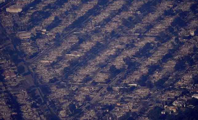 The devastation from the Palisades Fire is seen from the air in the Pacific Palisades neighborhood of Los Angeles, Thursday, Jan. 9, 2025. (AP Photo/Mark J. Terrill)