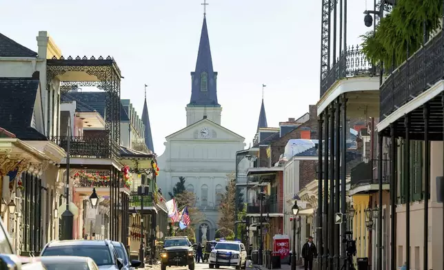 The St. Louis Cathedral is seen on Orleans St is seen in the French Quarter where a suspicious package was detonated after a person drove a truck into a crowd earlier on Bourbon Street on Wednesday, Jan. 1, 2025. (AP Photo/Matthew Hinton)