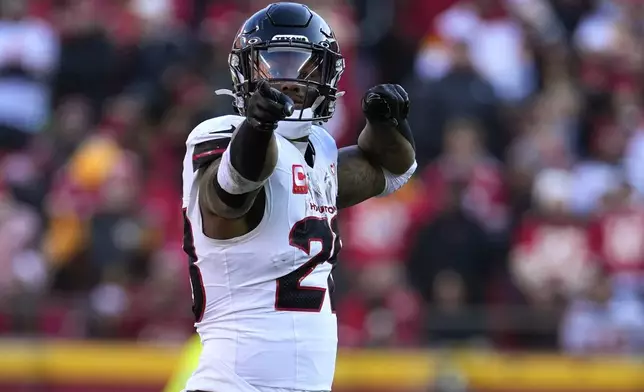 Houston Texans running back Joe Mixon celebrates after gaining a first down during the first half of an NFL football game against the Kansas City Chiefs Saturday, Dec. 21, 2024, in Kansas City, Mo. (AP Photo/Ed Zurga)