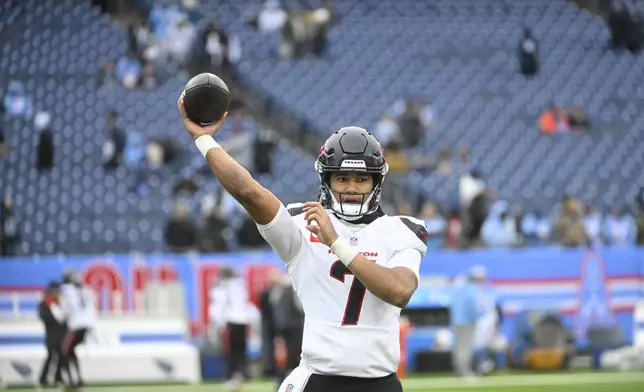 Houston Texans quarterback C.J. Stroud (7) warms up before an NFL football game against the Tennessee Titans Sunday, Jan. 5, 2025, in Nashville, Tenn. (AP Photo/George Walker IV)