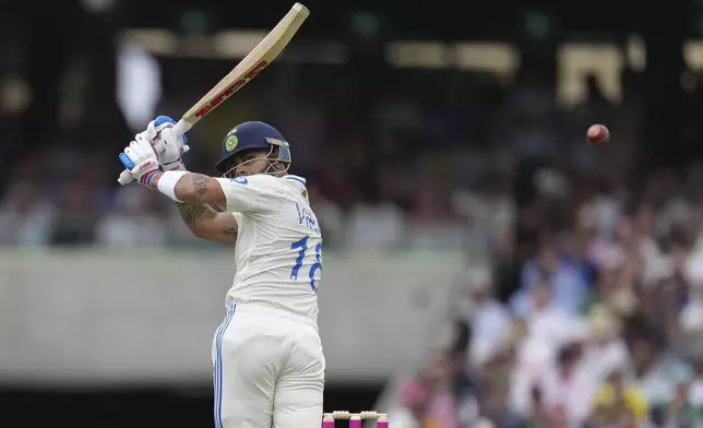 India's Virat Kohli bats during play on the first day of the fifth cricket test between India and Australia at the Sydney Cricket Ground, in Sydney, Australia, Friday, Jan. 3, 2025. (AP Photo/Mark Baker)