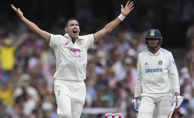 Australia's Scott Boland appeals unsuccessfully for the wicket of India's Shubman Gill during play on the first day of the fifth cricket test between India and Australia at the Sydney Cricket Ground, in Sydney, Australia, Friday, Jan. 3, 2025. (AP Photo/Mark Baker)