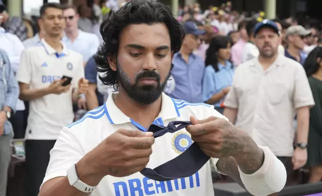 India's KL Rahul prepares for play on the first day of the fifth cricket test between India and Australia at the Sydney Cricket Ground, in Sydney, Australia, Friday, Jan. 3, 2025. (AP Photo/Mark Baker)