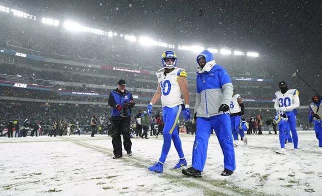 Los Angeles Rams wide receiver Cooper Kupp (10) leaves the field after an NFL football NFC divisional playoff game against the Philadelphia Eagles on Sunday, Jan. 19, 2025, in Philadelphia. (AP Photo/Derik Hamilton)