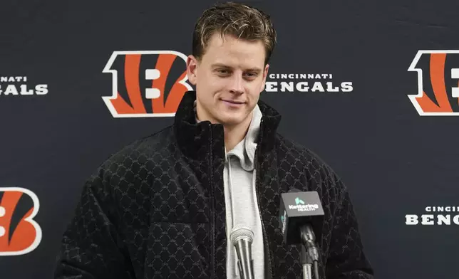 Cincinnati Bengals quarterback Joe Burrow pauses as he speaks during a news conference after an NFL football game against the Pittsburgh Steelers in Pittsburgh, Saturday, Jan. 4, 2025. The Bengals won 19-17. (AP Photo/Matt Freed)