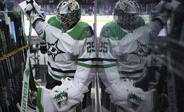 Dallas Stars' Jake Oettinger walks off the ice after warming up before an NHL hockey game against the Philadelphia Flyers, Thursday, Jan. 9, 2025, in Philadelphia. (AP Photo/Matt Slocum)