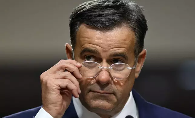 John Ratcliffe, President-elect Donald Trump's choice to be the Director of the Central Intelligence Agency, appears before the Senate Intelligence Committee for his confirmation hearing, at the Capitol in Washington, Wednesday, Jan. 15, 2025. (AP Photo/John McDonnell)