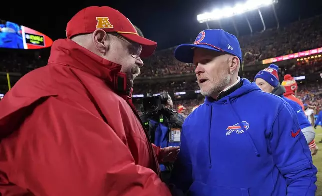 Kansas City Chiefs head coach Andy Reid speaks with Buffalo Bills head coach Sean McDermott after the AFC Championship NFL football game, Sunday, Jan. 26, 2025, in Kansas City, Mo. (AP Photo/Ashley Landis)