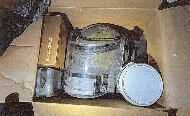 This image provided by U.S. Attorney’s Office, Eastern District of Virginia shows a stockpile of homemade explosives Federal agents seized when they arrested a Virginia man on a firearms charge in Dec. 2024. (U.S. Attorney’s Office, Eastern District of Virginia via AP)