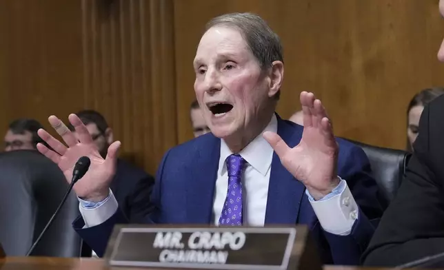 Ranking Member Ron Wyden, D-Ore., speaks at the Senate Finance Committee confirmation hearing for Scott Bessent, President-elect Donald Trump's choice to be Secretary of the Treasury, at the Capitol in Washington, Thursday, Jan. 16, 2025. (AP Photo/Ben Curtis)