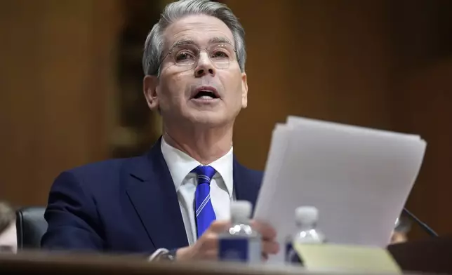 Scott Bessent, President-elect Donald Trump's choice to be secretary of the Treasury, appears before the Senate Finance Committee for his confirmation hearing, at the Capitol in Washington, Thursday, Jan. 16, 2025. (AP Photo/J. Scott Applewhite)