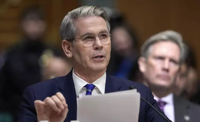 Scott Bessent, President-elect Donald Trump's choice to be Secretary of the Treasury, appears before the Senate Finance Committee for his confirmation hearing, at the Capitol in Washington, Thursday, Jan. 16, 2025. (AP Photo/Ben Curtis)
