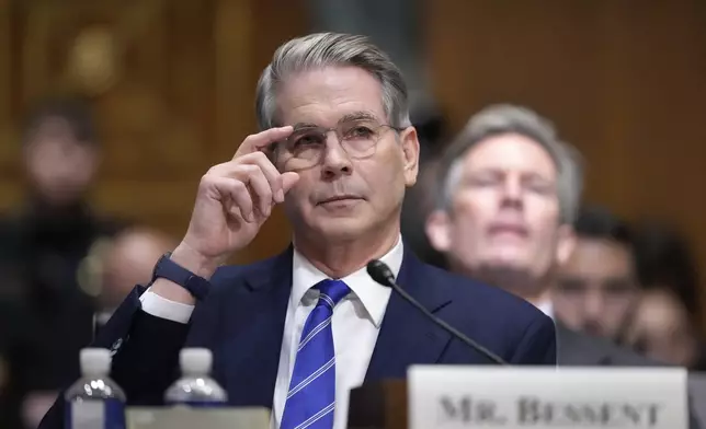 Scott Bessent, President-elect Donald Trump's choice to be Secretary of the Treasury, appears before the Senate Finance Committee for his confirmation hearing, at the Capitol in Washington, Thursday, Jan. 16, 2025. (AP Photo/Ben Curtis)