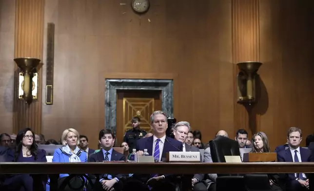 Scott Bessent, President-elect Donald Trump's choice to be Secretary of the Treasury, appears before the Senate Finance Committee for his confirmation hearing, at the Capitol in Washington, Thursday, Jan. 16, 2025. (AP Photo/Ben Curtis)