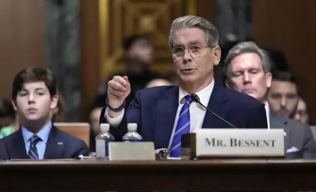 Scott Bessent, President-elect Donald Trump's choice to be Secretary of the Treasury, appears before the Senate Finance Committee for his confirmation hearing, at the Capitol in Washington, Thursday, Jan. 16, 2025. (AP Photo/Ben Curtis)